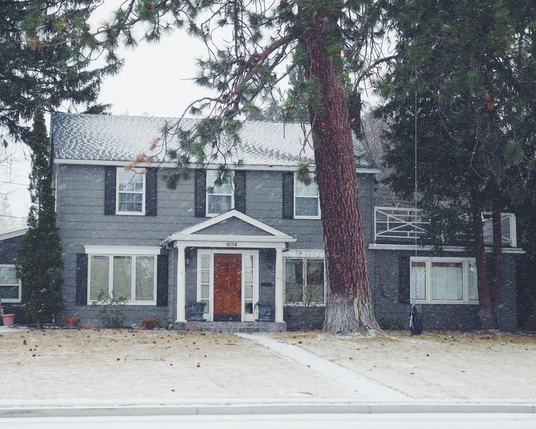 freshly painted house exterior to help prevent weather damage