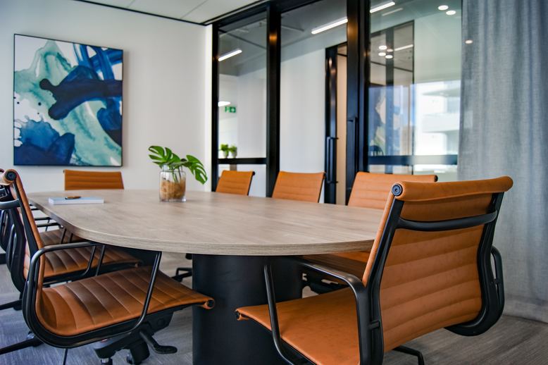 newly remodeled and painted conference room in office building