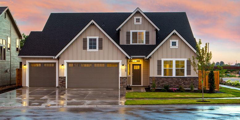 front view of two-story house after rain