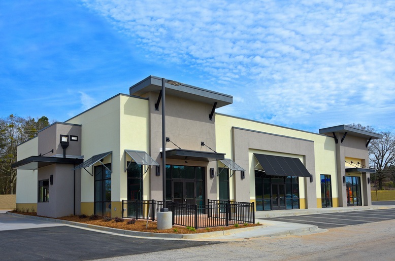 freshly painted exterior of commercial building