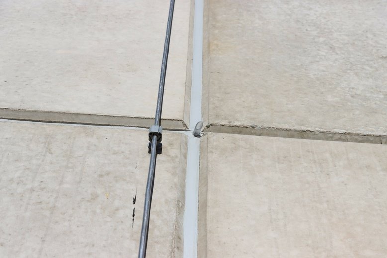 newly repaired joint caulking for expansion joint on commercial building