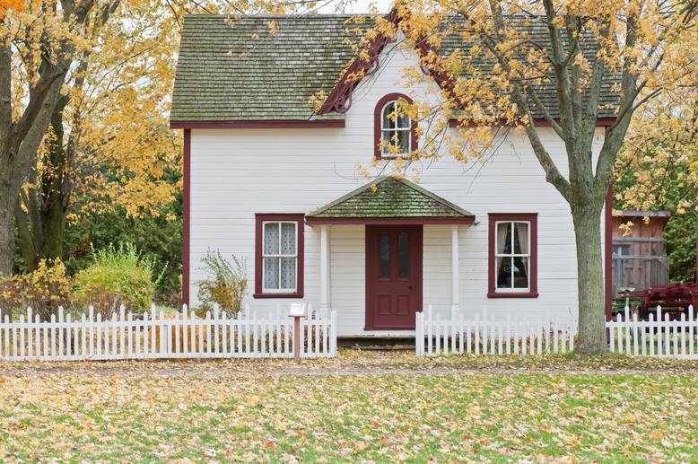 home exterior newly repainted by professional painters during autumn