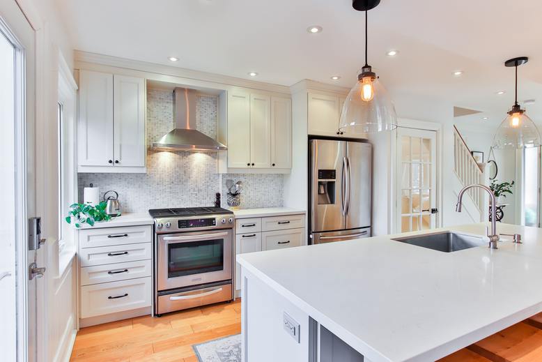 kitchen cabinets and walls freshly painted by professional painters