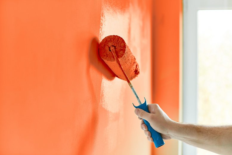 professional painter expertly painting home interior
