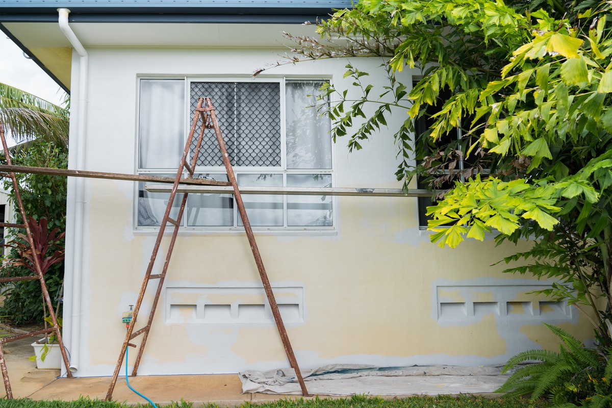 house exterior being repainted during spring