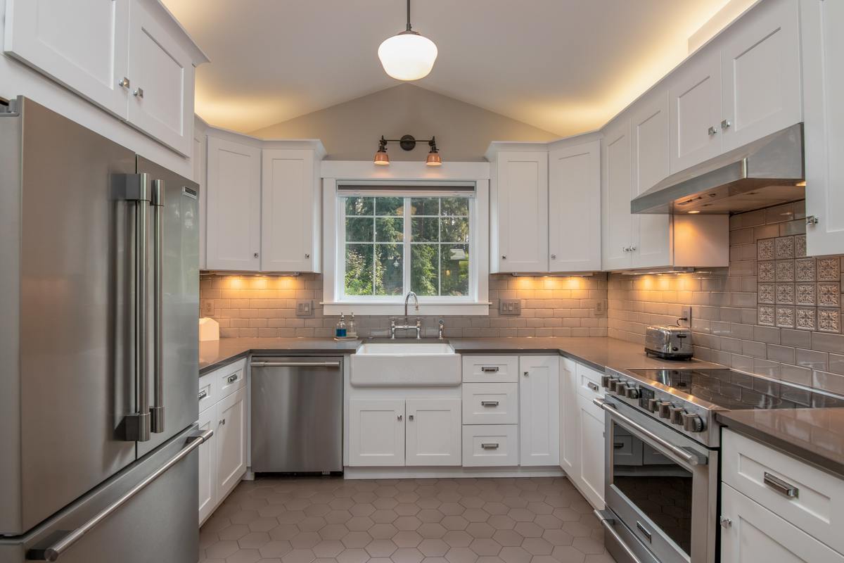 kitchen with white painted cabinets