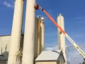 agricultural silo being repainted
