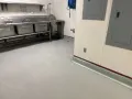 new cement flooring in commercial kitchen