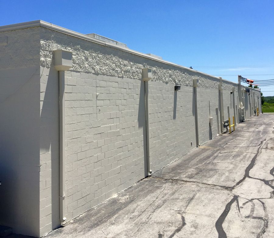 waterproofing coatings applied on a commercial building